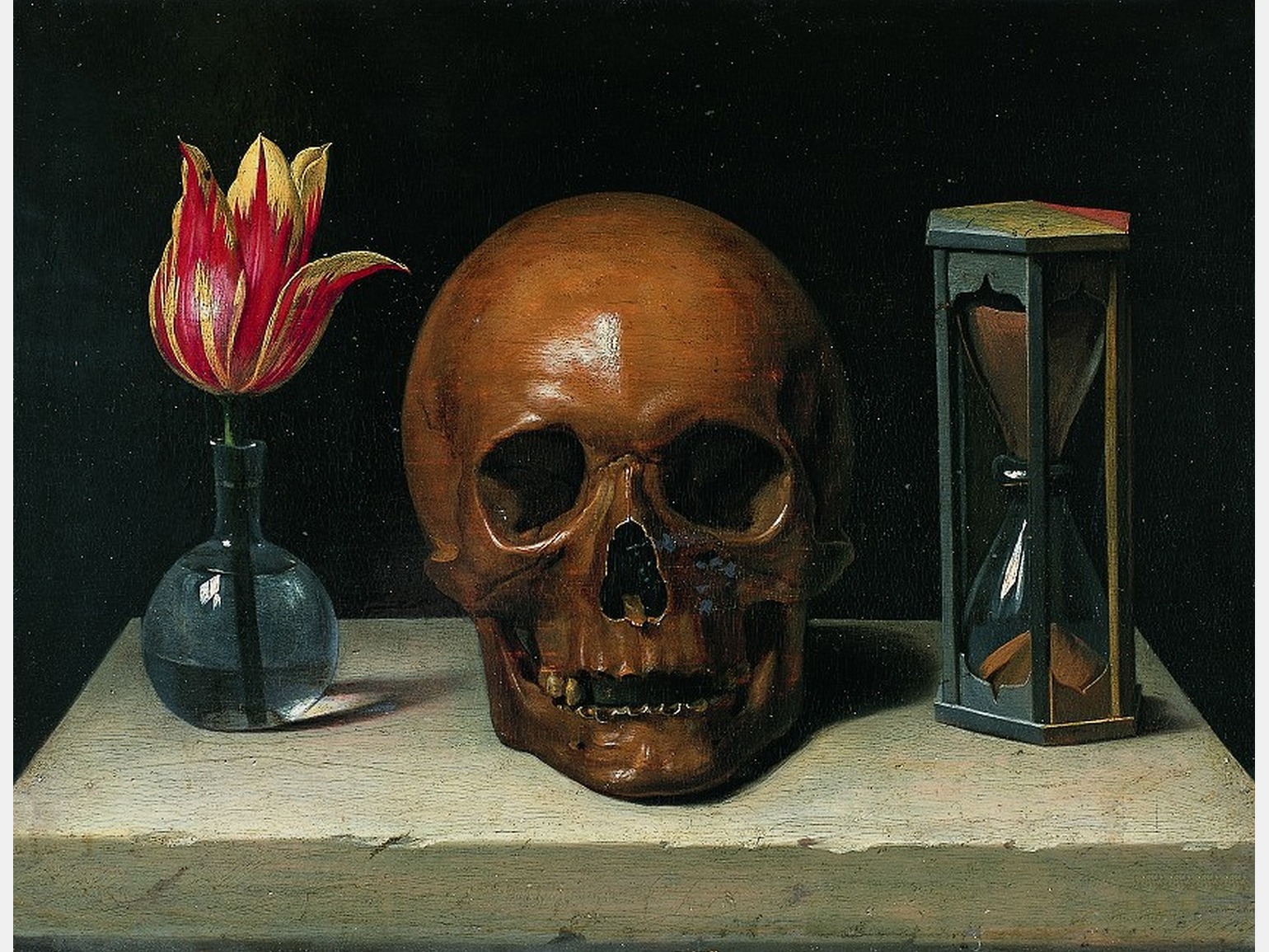 натюрморт в стиле vanitas с цветком и песочными часами

